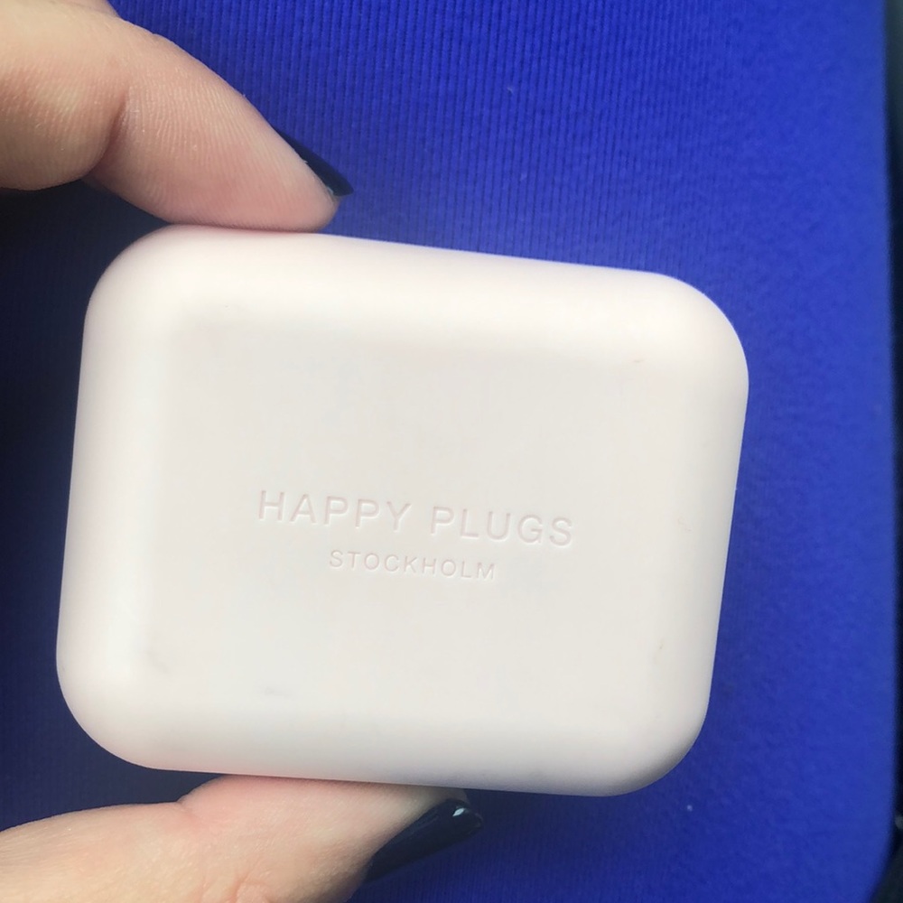 Happy Plugs ear plugs. wireless/Bluetooth earphone